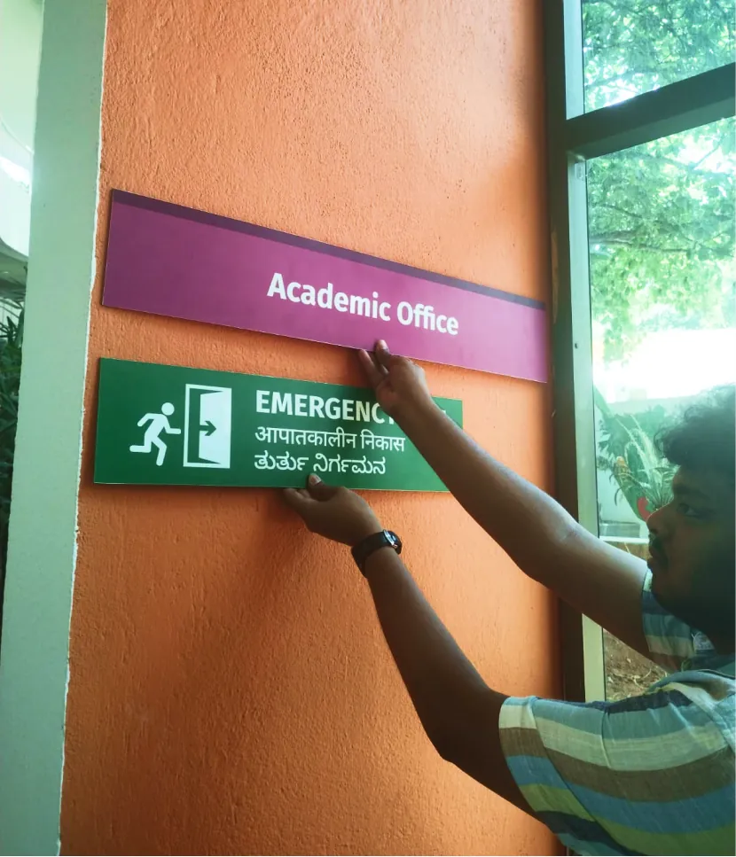 Fixing the Academic Office sign